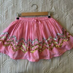 Mini Boden 7/8 pink gathered skirt w/silver and gold sequins zig zag pattern.